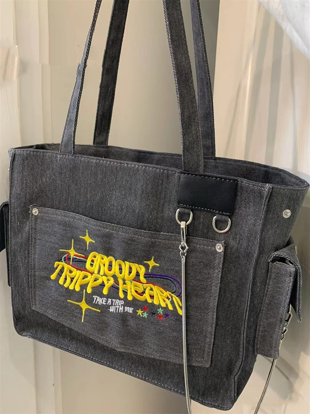 Bag with embroidered letters
